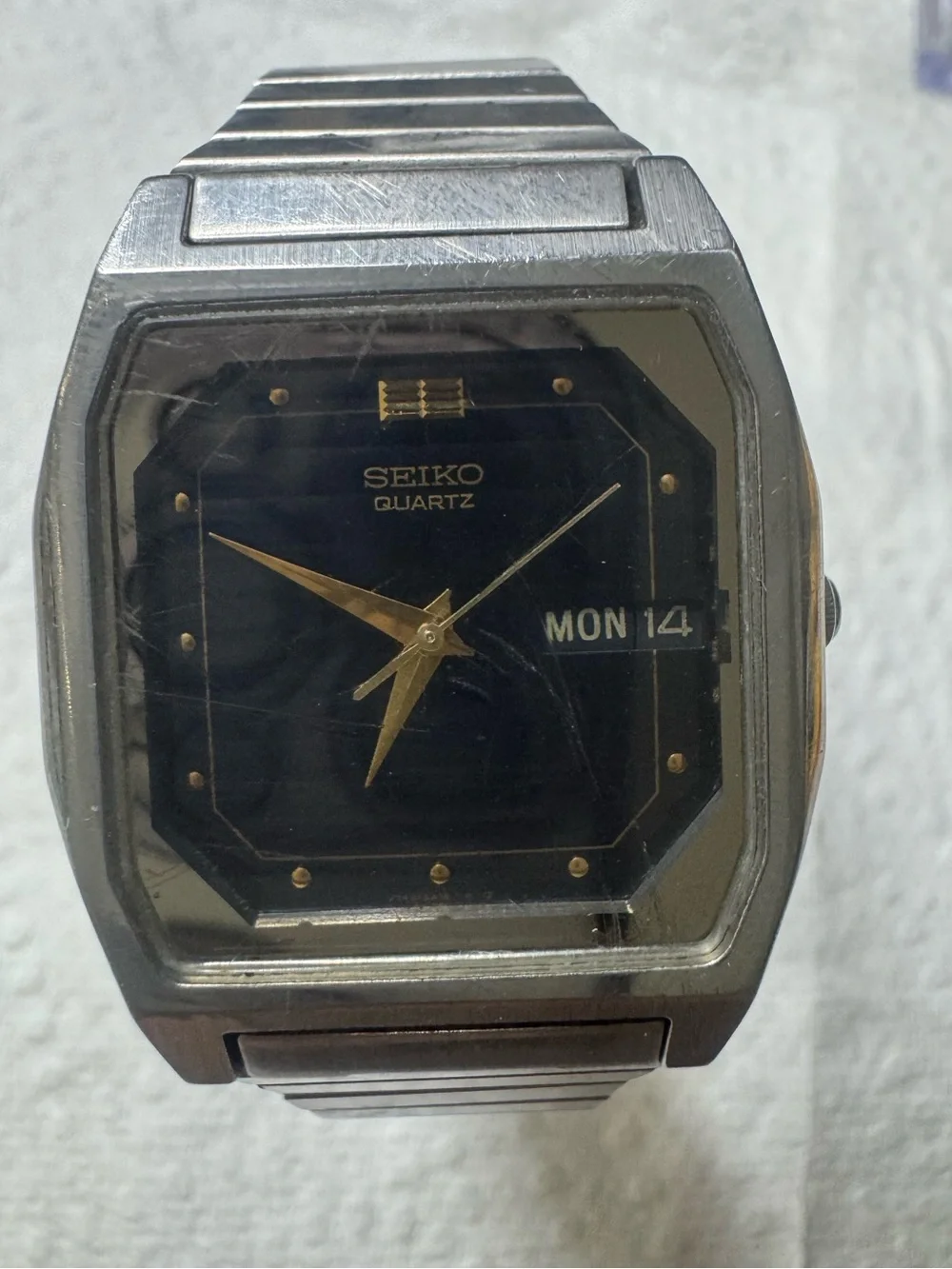 Seiko Black Dial Stainless Steel Watch with Gold Accents